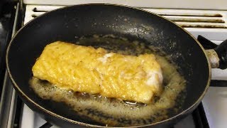 A skinless cod fillet,simply fried in olive oil butter and lemon
juice.cooked real time,only 7 minutes to the perfect fillet,tender
white flakes of ju...