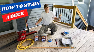 Should I use a brush or roller to stain my deck?