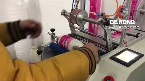 Desktop round bottle rolling labeling machine testing video