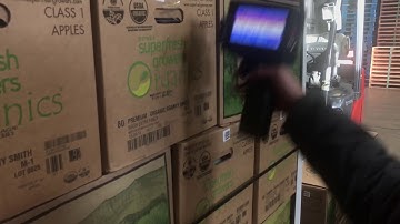 Meenjet M3S Handheld Printer Coding Palletized Boxes in Warehouse - JS12 Black Ink