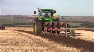 John Deere 6930 tractor with Kverneland ED 85 5 furrow reversible plough.