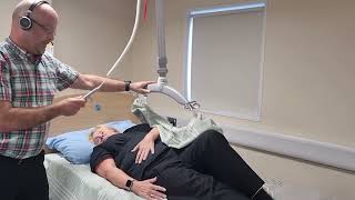Rolling a Person in Bed using Satin Sheets and Passive Hoist