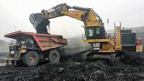 Caterpillar 6020B Excavator Expert Operator Loading Coal to Cat 777 and Komatsu HD785