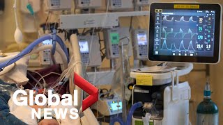 US breaks records for daily COVID-19 cases, hospitalizations