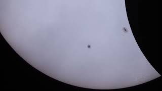 Object transit during partial solar eclipse
