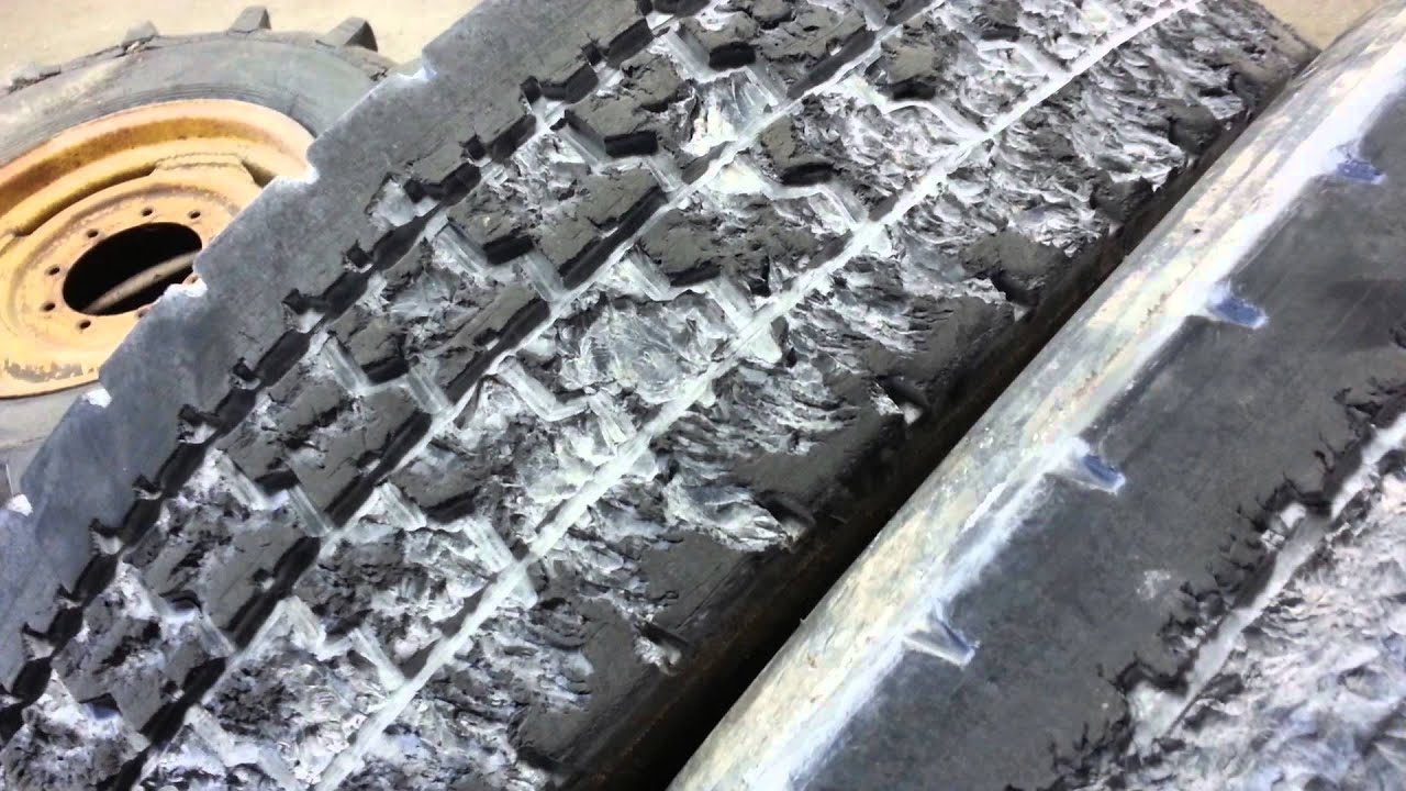 Changing Tires and Air Leak on Semi Truck in a shop for Commercial