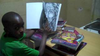 A boy in Uganda enjoying The 64 Faces of Awakening Coloring Book