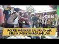 POLRES NGANJUK SALURKAN AIR BERSIH UNTUK WARGA NGLUYU