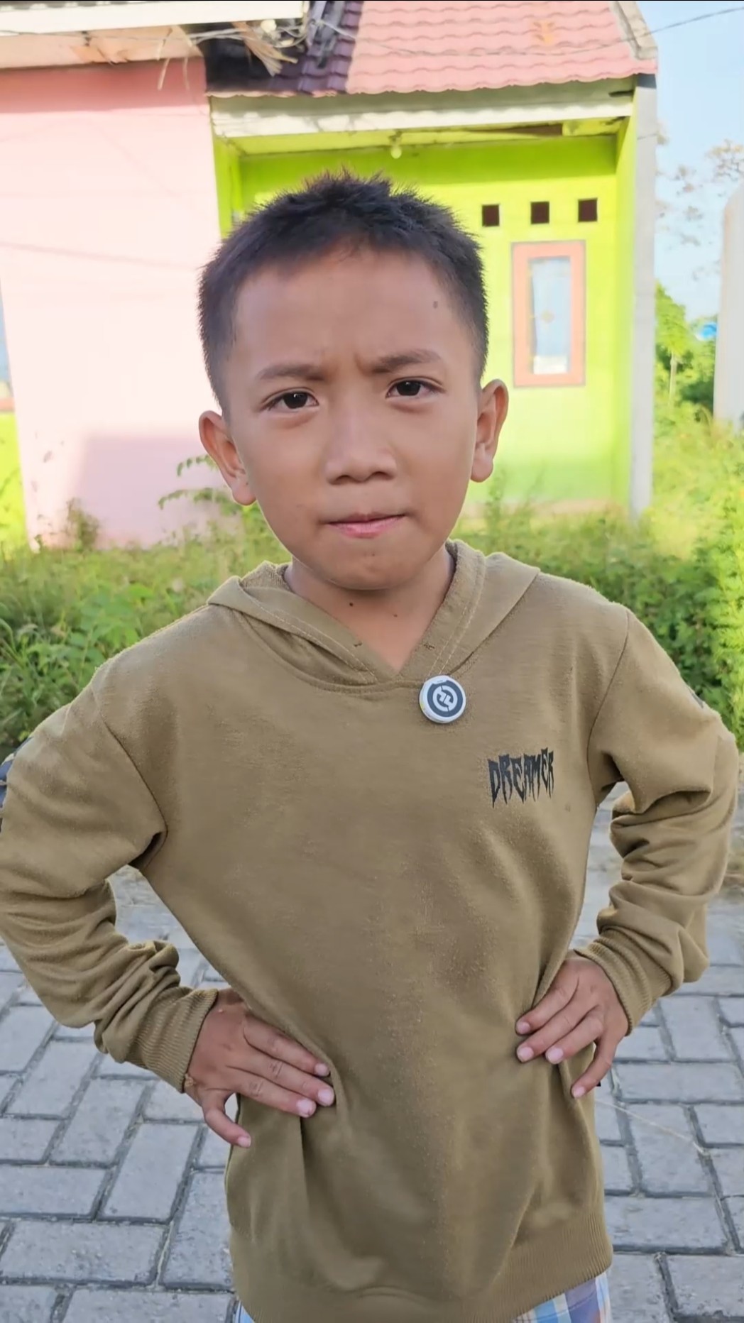 This little brat was insulted by being bald
