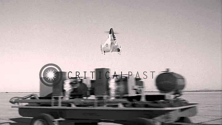 U.S. military XFY-1 Pogo hovers over land during a test flight...HD Stock Footage