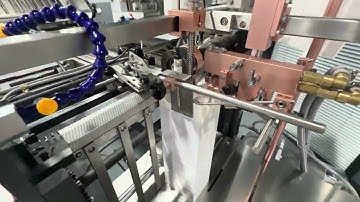 Speed Machinery-buckle folding machine