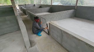 Time-lapse video of welding iron doors and installing automatic pig feeders