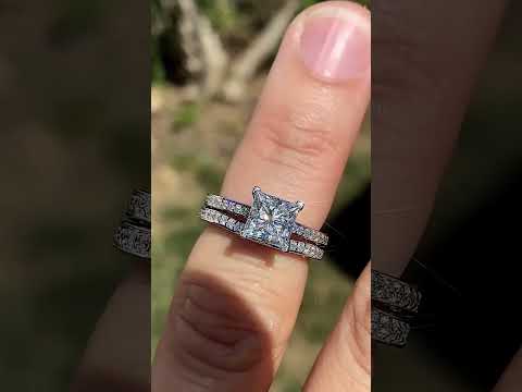 Round Brilliant Moissanite Scroll Engagement Ring ring video
