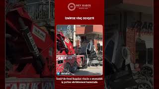 İzmir'de freni boşalan vincin 2 otomobili iş yerine sürüklemesi kamerada