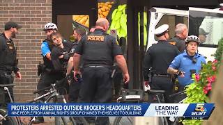 Police: 9 arrested after protesters chain themselves to Kroger headquarters