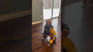 He riding his little bike for the first time I’ll buy himself