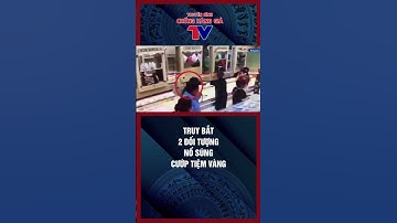 Hai tên cướp mang vật giống súng xông vào tiệm vàng, đập tủ kính, cướp vàng, leo lên xe máy bỏ chạy