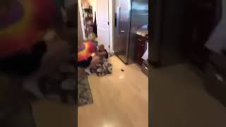 Kid gets dragged on blanket and hits head on door