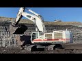 White Caterpillar 385C Excavator Loading Coal On Trucks - Interkat SA