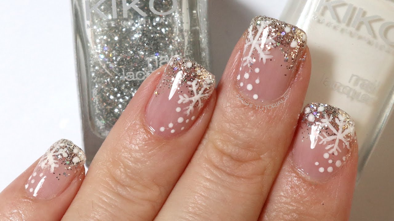 6. Dark Blue and White Snowflake Accent Nail Design for Winter - wide 2