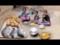 indian tribal village cooking FISH CURRY by a santali grand mother for her lunch||rural village life