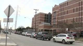 Clinic offering COVID vaccines, testing, draws large crowd outside Bexar County jail