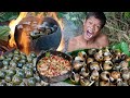 Primitive technology  kmeng prey  cooking snails solo  eating delicious