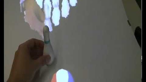 MirageTable- Freehand Interaction on a Projected Augmented Reality Tabletop