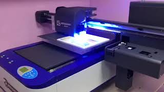 Celebrity MULTI-FUNCTION SMALL UV FLATBED PRINTER WITH WHITE AND VARNISH HEAD Wealth