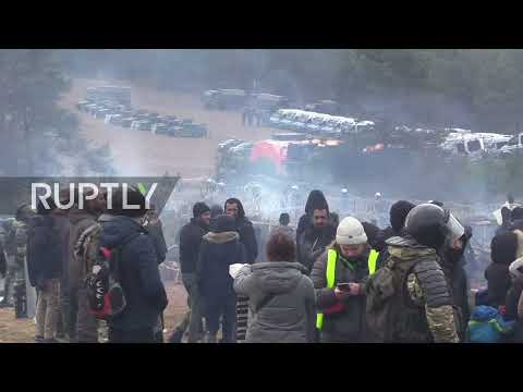 Belarus: Migrants at Polish border flock to collect wood as crisis continues
