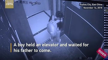 Boy Uses Umbrella to prevent elevator from closing ll ss collection ll