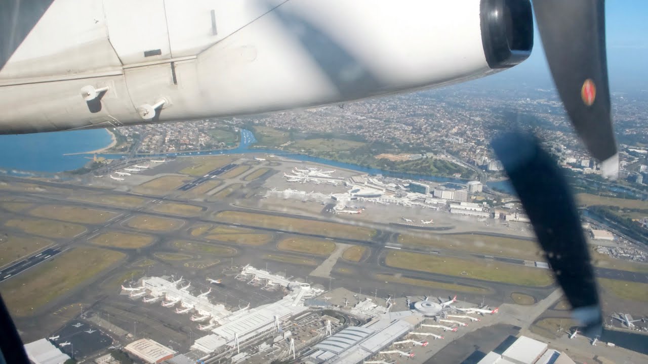 QantasLink Bombardier Dash-8 Q300 takeoff from Sydney Airport