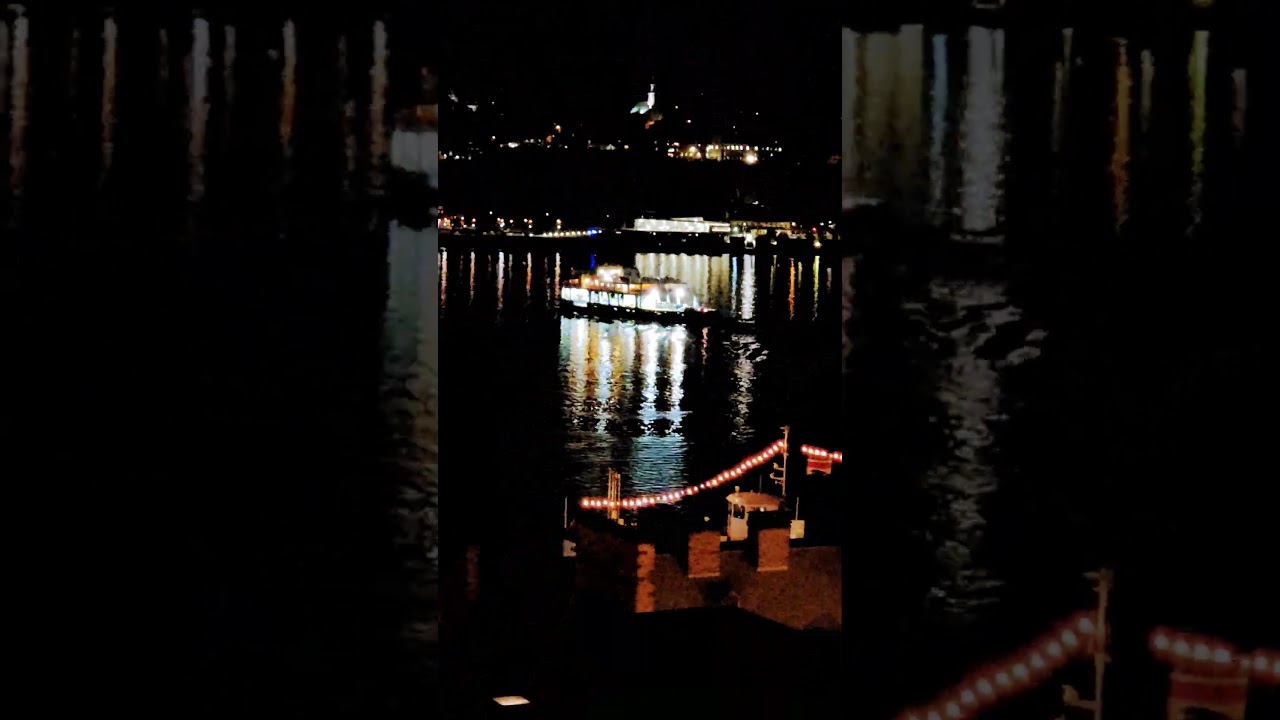 Night time Ferry boat crossing the St Lawrence river Quebec city Canada