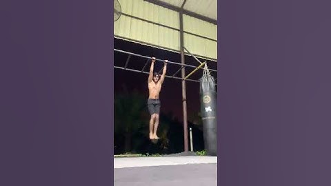 Guy Swings On Monkey Bars And Falls - 1094244