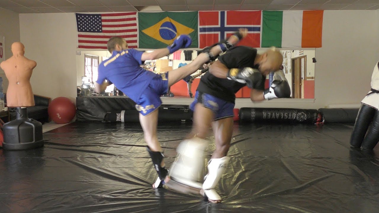 Counter a High Roundhouse with a Low Spin Hook Kick TKD Kickboxing Combos YouTube
