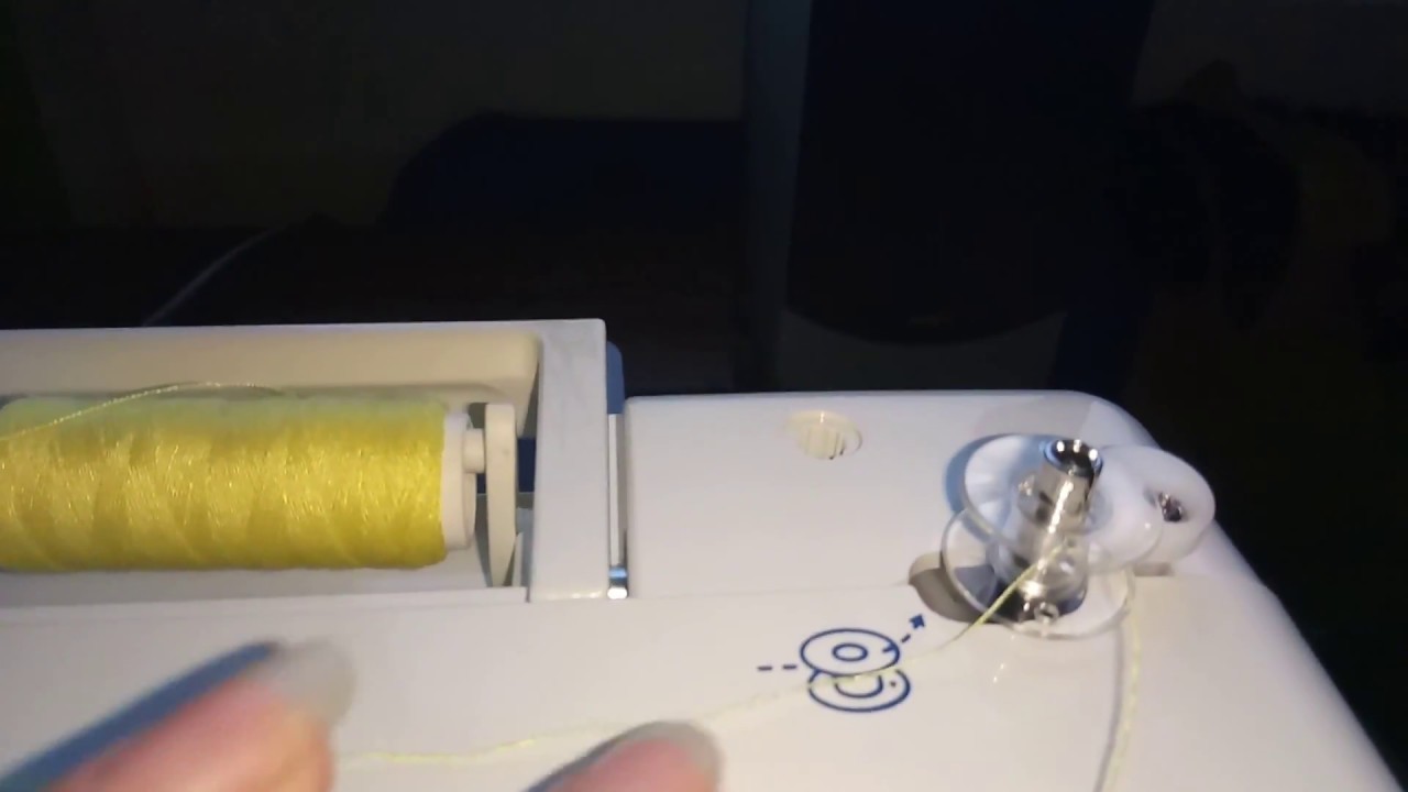 Как наматывать нить на швейной машинке