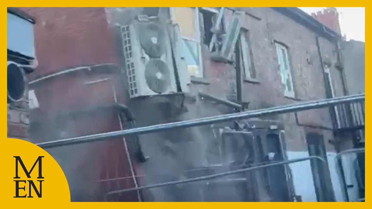Moment building collapses in dramatic footage with cordon in place
