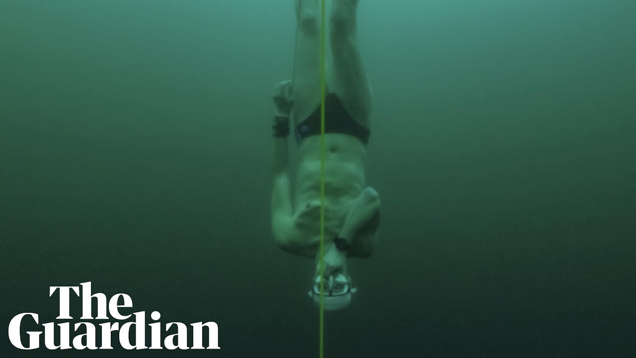 Free-diver David Vencl plunges to record depth in frozen Swiss lake