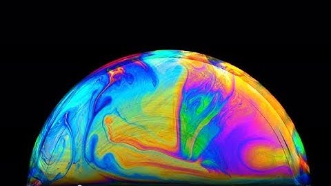 Multi-colored Iris of a Soap Bubble in Motion | Stock Footage - Videohive