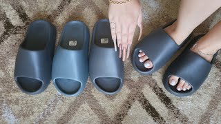 YEEZY SLIDE GRANITE IN HAND ON FEET NEXT TO SLATE MARINE SLATE GRAY ONYX SIZING AND COLOR