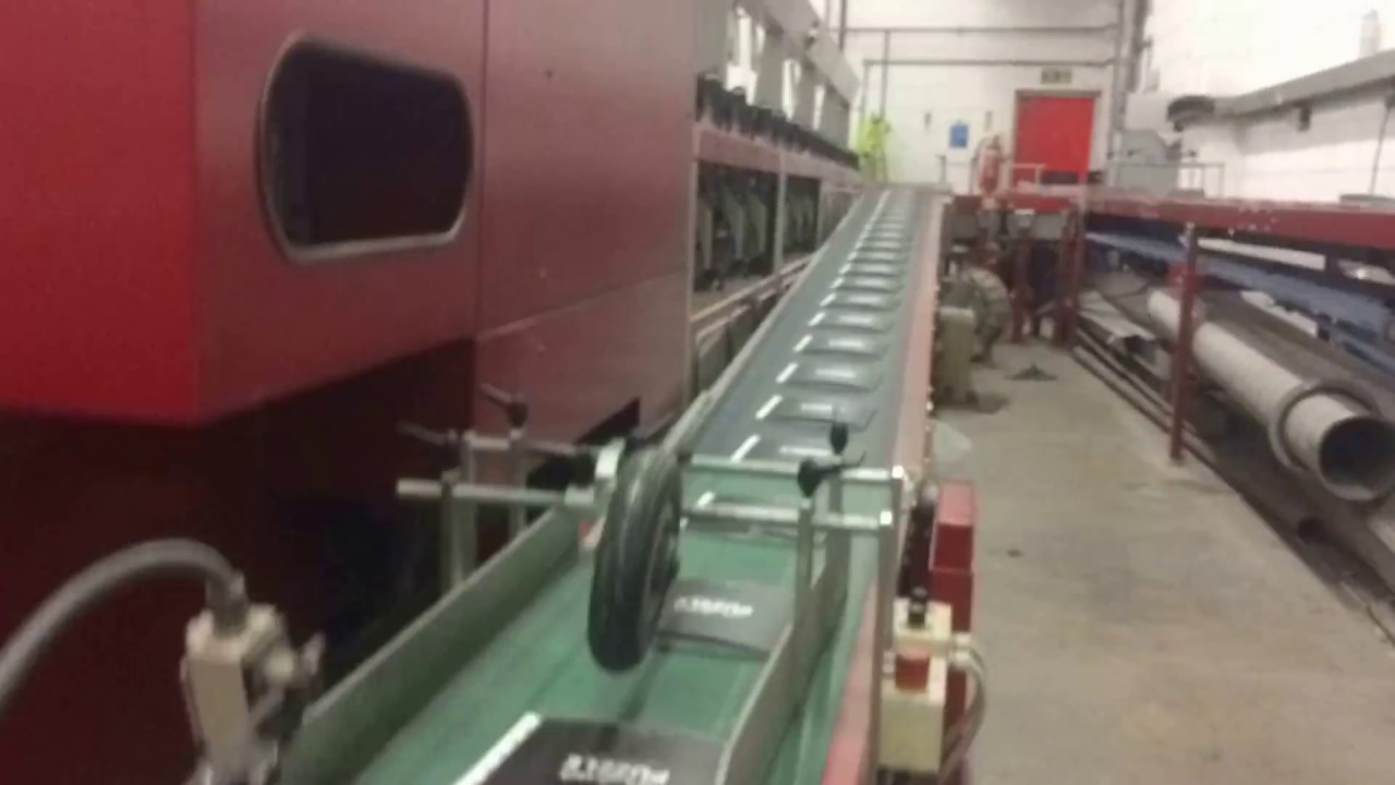 Conveyor belts moving print around the Print Factory.