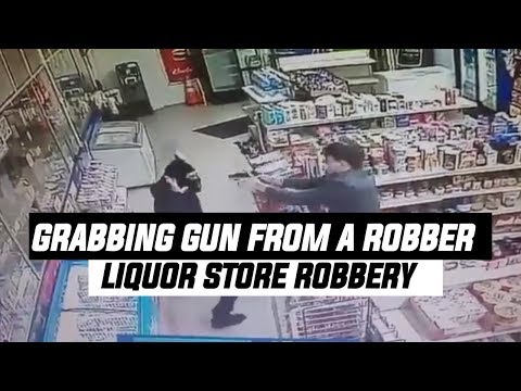 fake:-man-grabs-gun-from-robber-in-a-liquor-store-|-viral-video