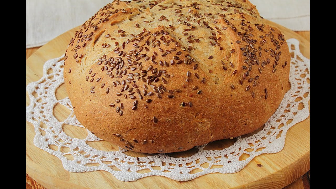 Хлеб в духовке видео. Домашний хлеб. Круглый хлеб. Круглый хлеб в духовке. Хлеб круглый в домашних условиях.