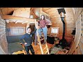 Canadian couple finish the interior of their secluded tiny log cabin  built without power tools