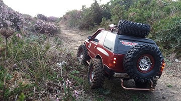 Tamiya CC01 Isuzu Amigo through the forest & climbing