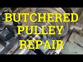 Butchered slotting head pulley repair 