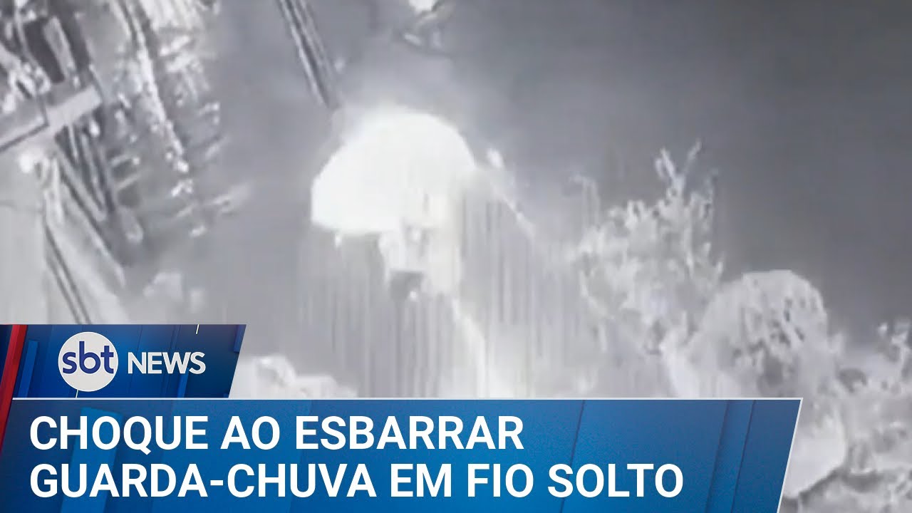 Mulher leva choque ao esbarrar guarda-chuva em fio de eletricidade solto | #SBTNews (15/03/25)