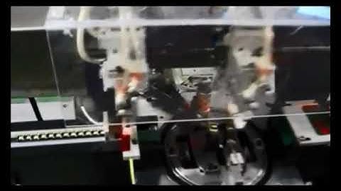 Automatic taping machine WM-1948T. newwinhk@hotmail.com