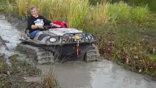 This is My Argo 650 HD with Adair tracks in a bad mud hole-river run