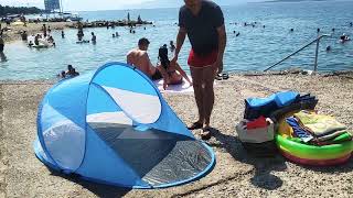Как свернуть пляжную палатку . How to roll up a beach tent